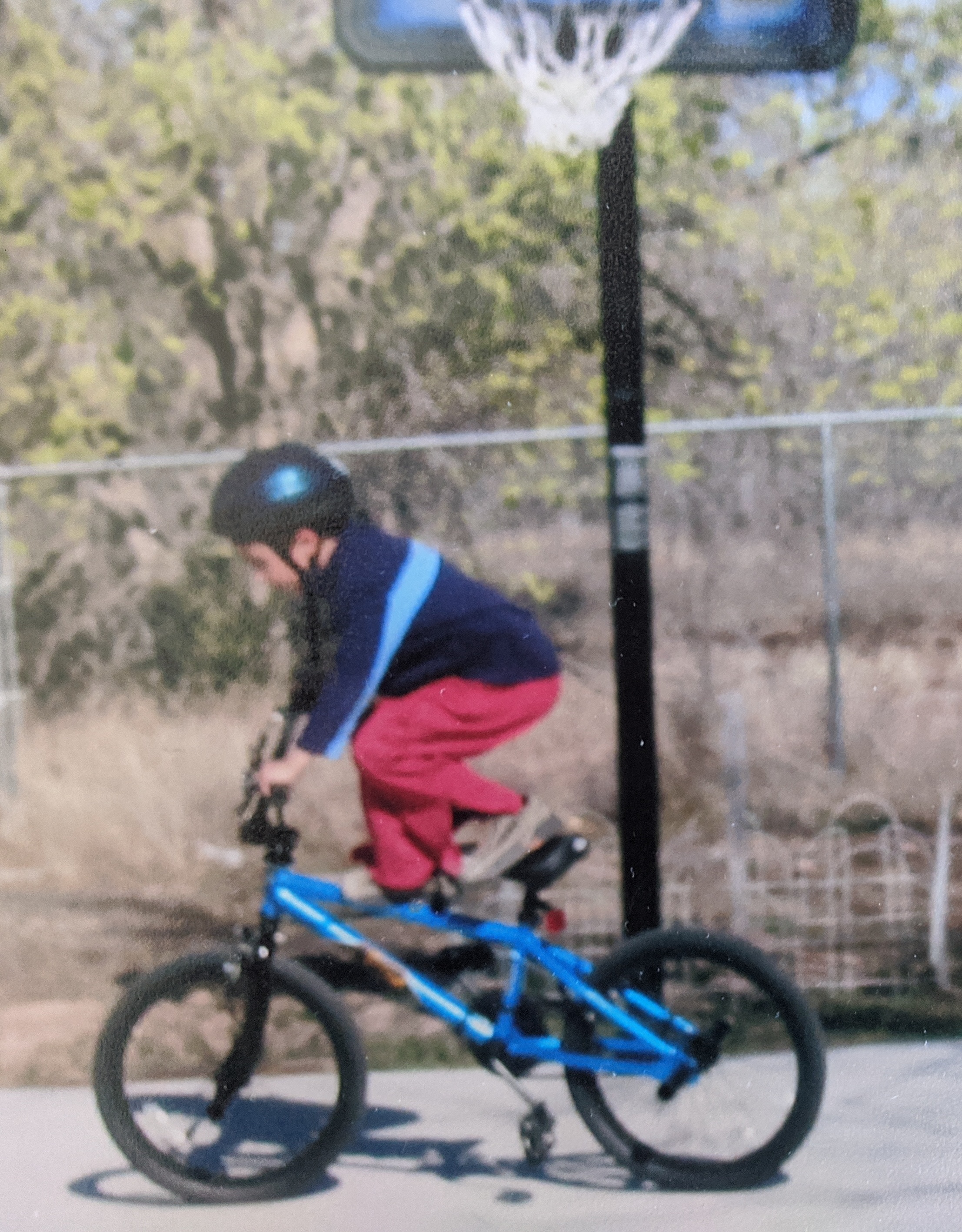 Nate as a kid on a bike